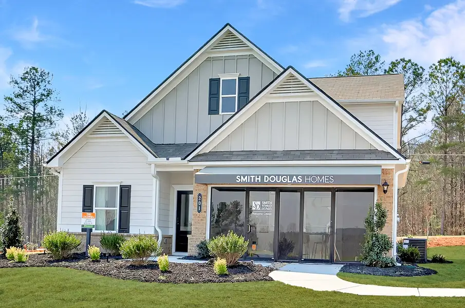 Front exterior of a new home in Oakmont, Dallas, GA, highlighting curb appeal (Image 1). Front exterior of a new home in Oakmont, Dallas, GA, highlighting curb appeal (Image 1).