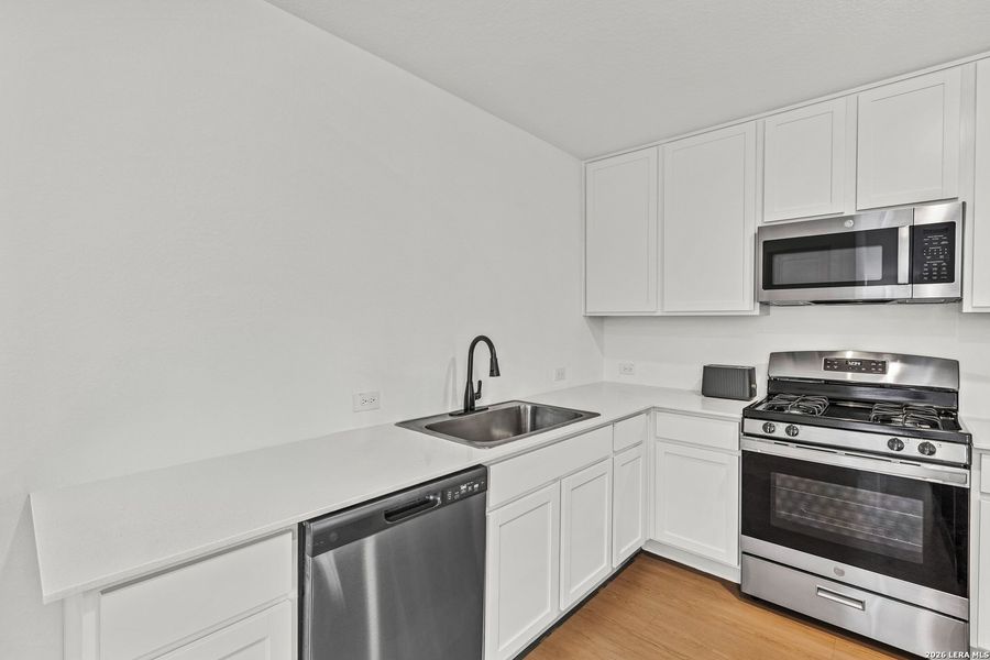 Furnished interior view inside a new home in Brookmill, San Antonio (Image 15).