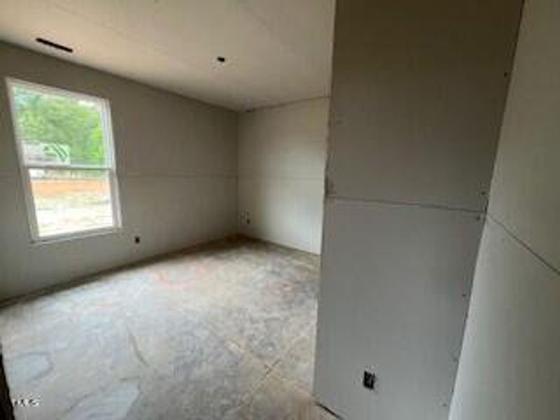 Spacious, unfurnished interior of a new home in Wellers Knoll, Lillington (Image 32).