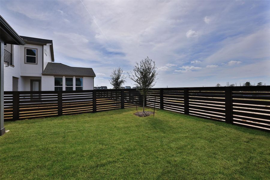 Exterior details and patio area of a home in Bridgeland Central, Cypress (Image 2). Exterior details and patio area of a home in Bridgeland Central, Cypress (Image 2).
