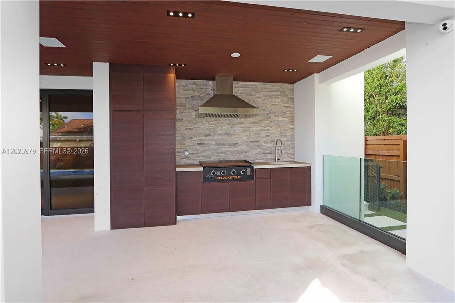 Exterior details and patio area of a home in , Miami (Image 23). Exterior details and patio area of a home in , Miami (Image 23).