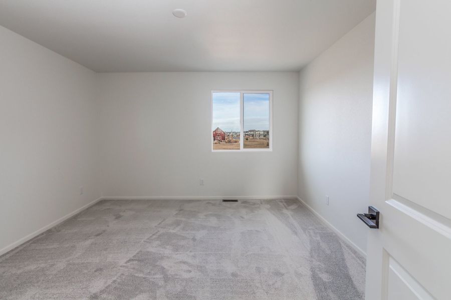 Spacious, unfurnished interior of a new home in Trailside, Timnath (Image 21).
