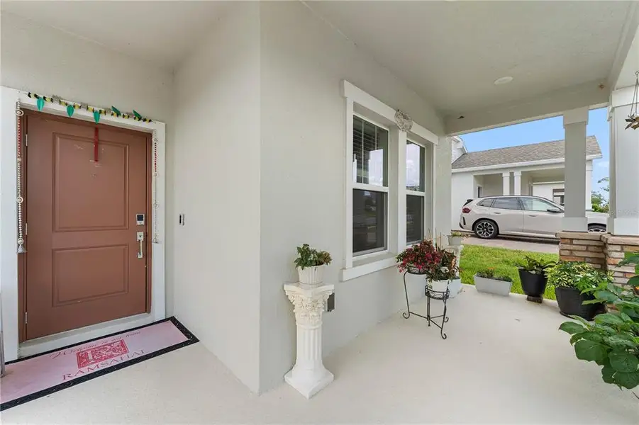 Exterior details and patio area of a home in Golden Orchard, Apopka (Image 3). Exterior details and patio area of a home in Golden Orchard, Apopka (Image 3).