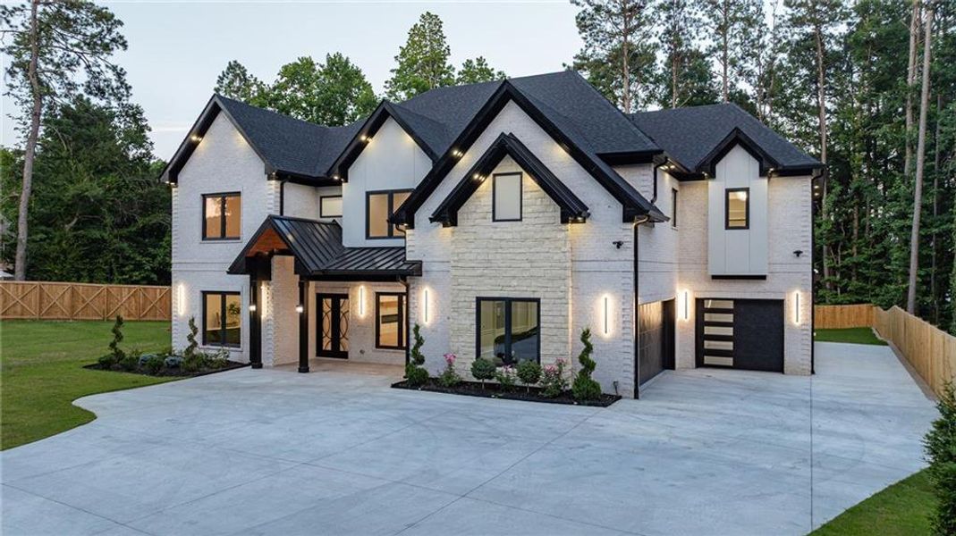 Front exterior of a new home in , Lawrenceville, GA, highlighting curb appeal (Image 33). Front exterior of a new home in , Lawrenceville, GA, highlighting curb appeal (Image 33).