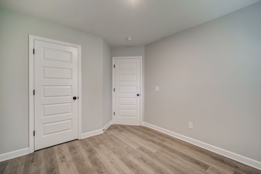 Representative unfurnished interior of a home built from the Draper by Parkside Builders in The Woods, Gallatin (Image 34).