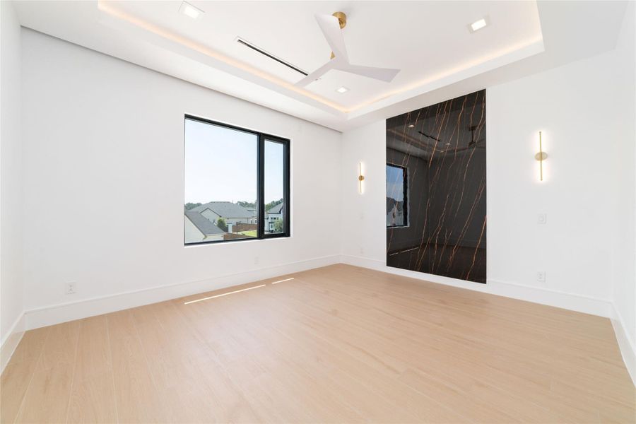 An additional private retreat completes the upper level.