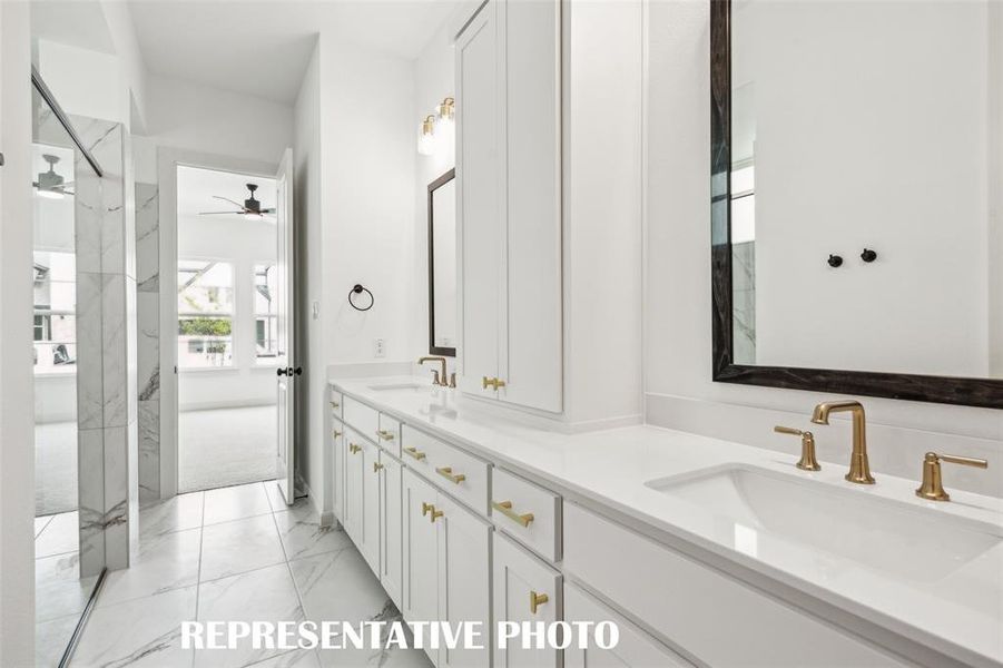 You'll enjoy ample space for two in this lovely owner's bath!  REPRESENTATIVE PHOTO