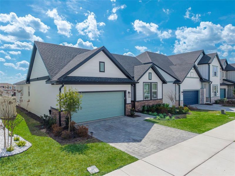 Front exterior of a new home in , Clermont, FL, highlighting curb appeal (Image 29). Front exterior of a new home in , Clermont, FL, highlighting curb appeal (Image 29).