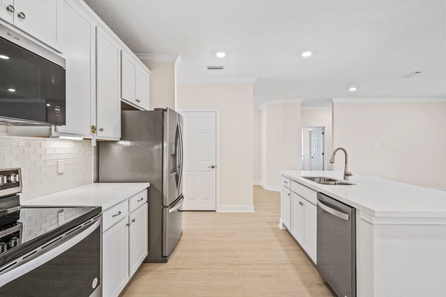 Furnished interior view inside a new home in Windswept Estates, Freeport (Image 4).