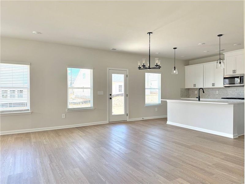 Spacious, unfurnished interior of a new home in Vines at Mill Creek - Estate Series, Braselton (Image 15).