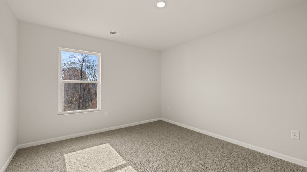 Spacious, unfurnished interior of a new home in The Reserve at Calcutta, Stockbridge (Image 20).