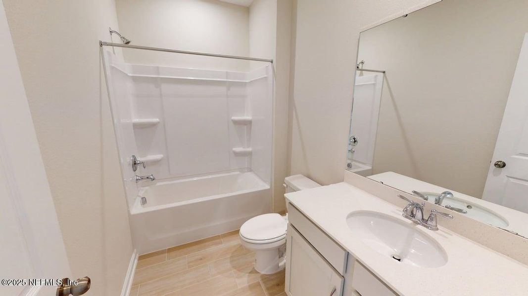 Furnished interior view inside a new home in Sandridge Hills, Green Cove Springs (Image 10).