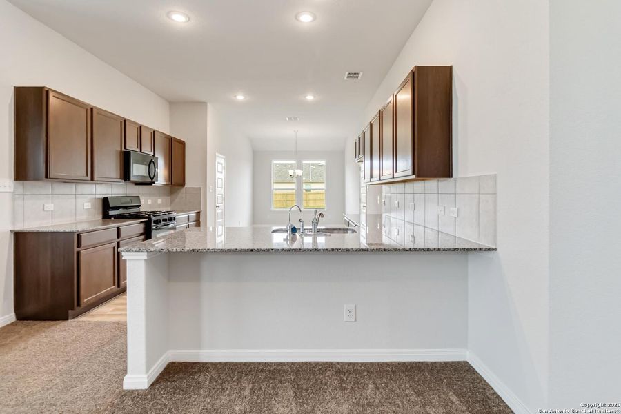 Furnished interior view inside a new home in Lonesome Dove, San Antonio (Image 13). Furnished interior view inside a new home in Lonesome Dove, San Antonio (Image 13).