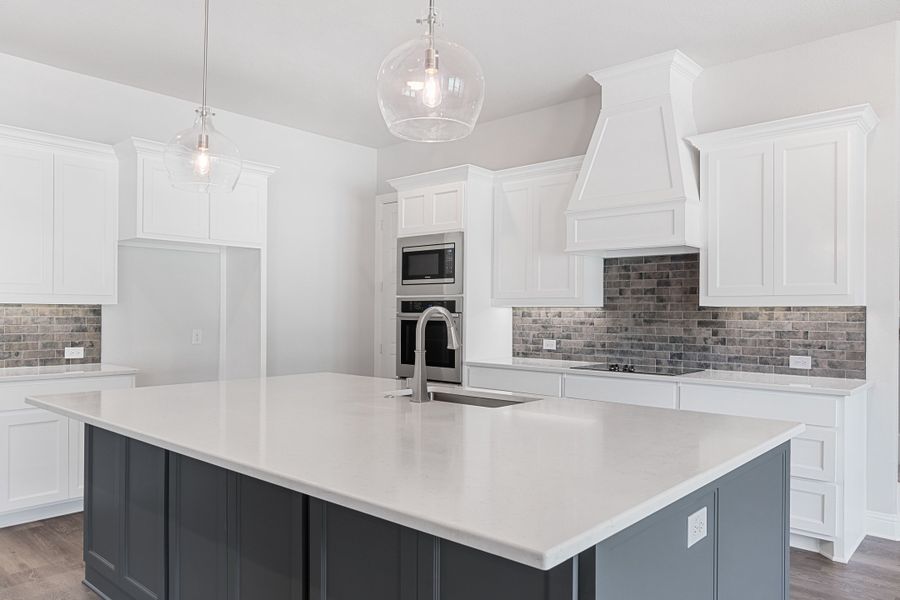 Representative furnished interior of a home built from the The Braden II by Doug Parr Custom Homes in Kessler Farms, Brock (Image 6).