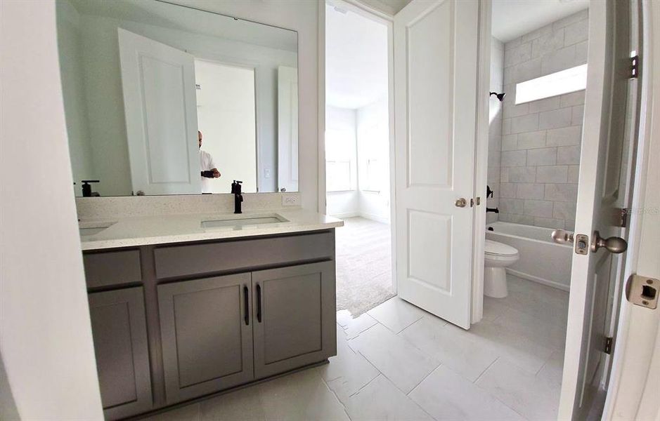 Furnished interior view inside a new home in Laureate Park, Orlando (Image 5).