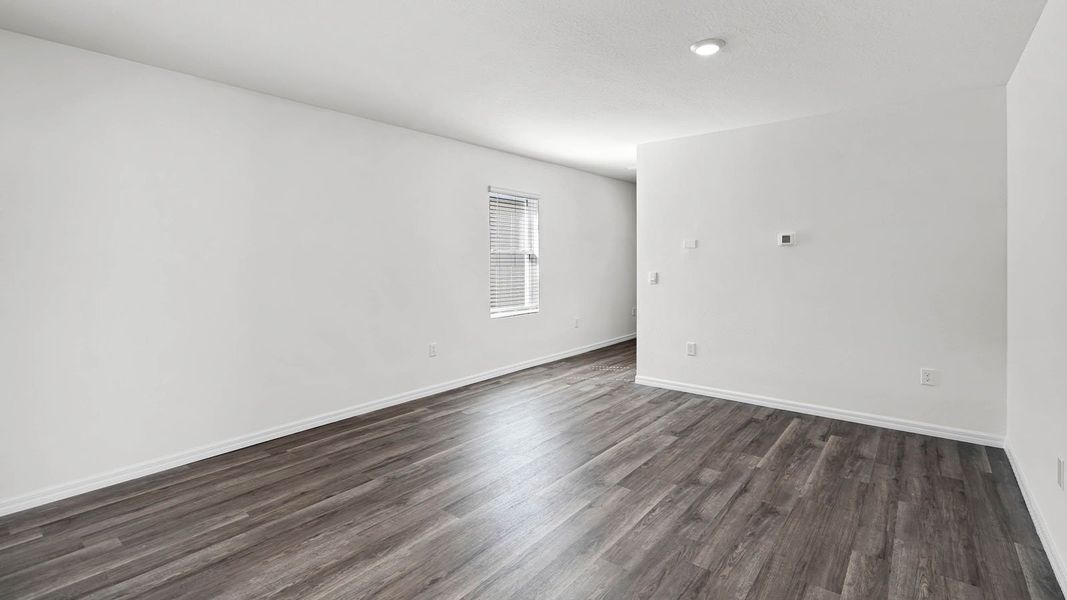 Representative unfurnished interior of a home built from the ASTOR by D.R. Horton in Harmony at Lake Eloise, Winter Haven (Image 12).