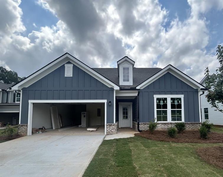 Front exterior of a new home in Red Bird Manor, Jefferson, GA, highlighting curb appeal (Image 1). Front exterior of a new home in Red Bird Manor, Jefferson, GA, highlighting curb appeal (Image 1).