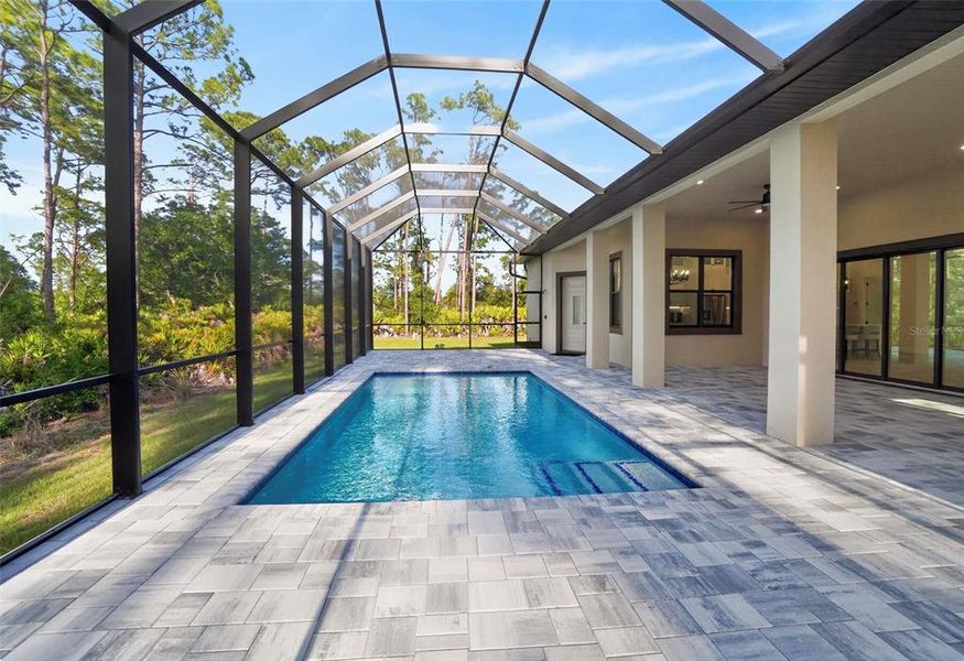 Exterior details and patio area of a home in , Port Charlotte (Image 36).