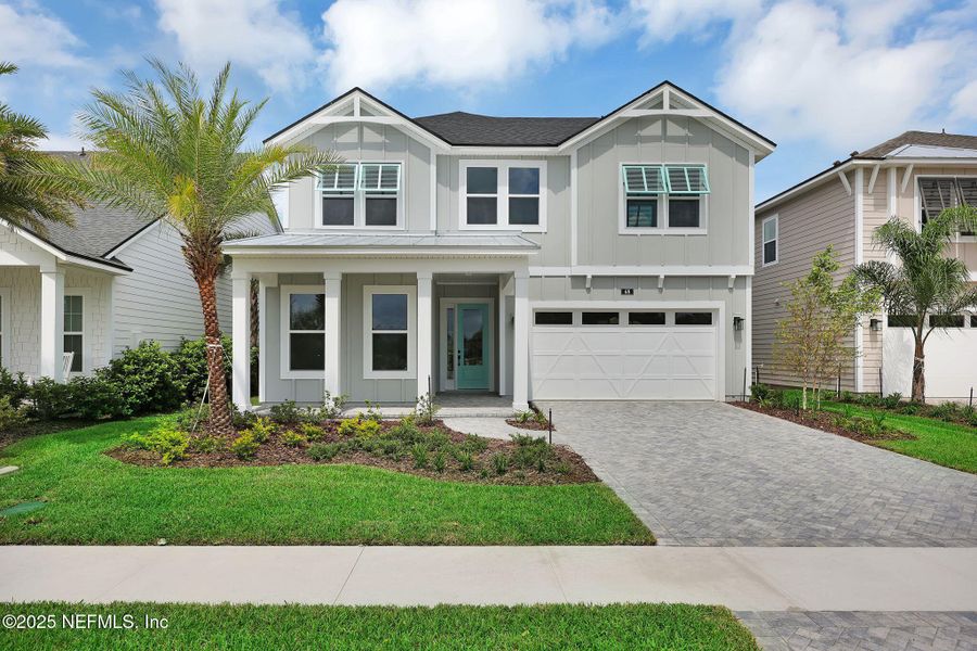 Front exterior of a new home in Seabrook Village at Seabrook, Ponte Vedra, FL, highlighting curb appeal (Image 26).