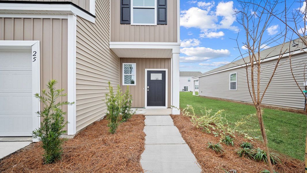 Front exterior of a new home in Rice Hope, Port Wentworth, GA, highlighting curb appeal (Image 2).