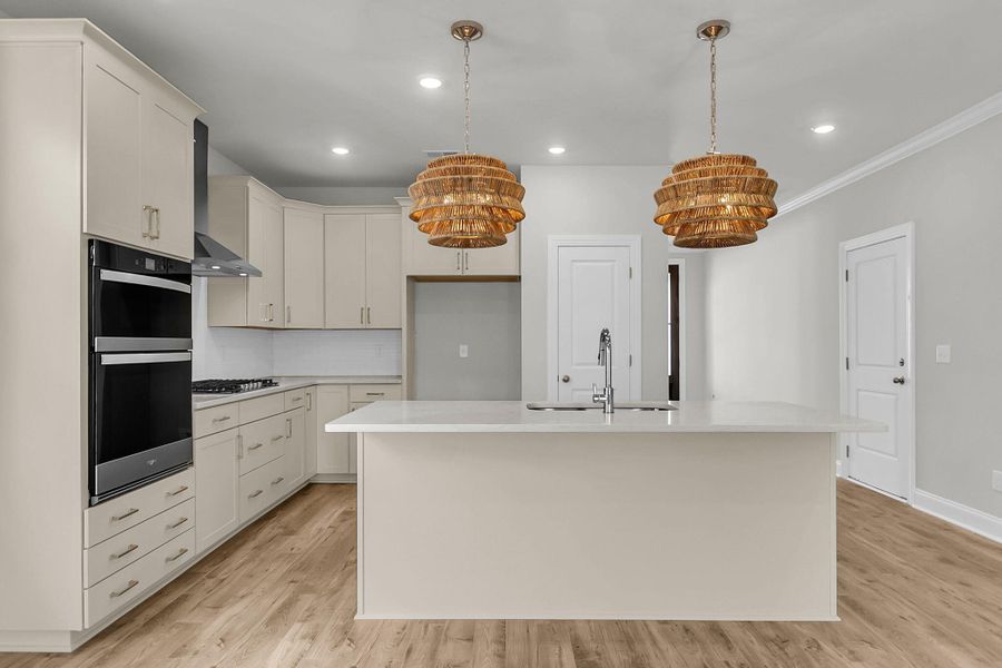 Furnished interior view inside a new home in Tidewater at Lakes of Cane Bay, Summerville (Image 8).
