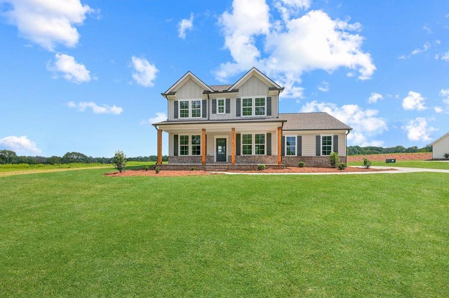 Front exterior of a new home in Magnolia Ridge, Monroe, GA, highlighting curb appeal (Image 15).