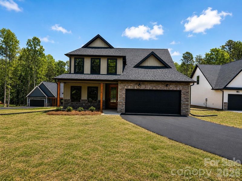 Front exterior of a new home in , Salisbury, NC, highlighting curb appeal (Image 26).