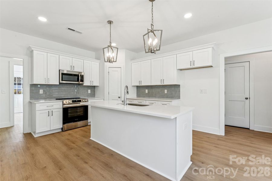 Furnished interior view inside a new home in , Concord (Image 9). Furnished interior view inside a new home in , Concord (Image 9).