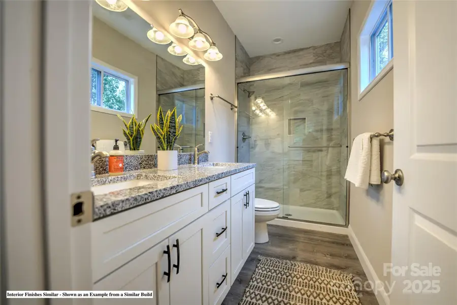 Furnished interior view inside a new home in , Asheville (Image 13).
