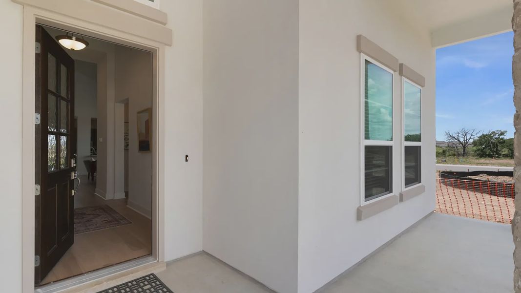 Exterior details and patio area of a home in Santa Rita Ranch, Liberty Hill (Image 3).