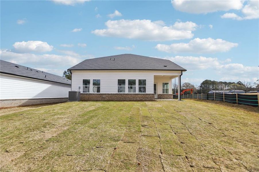 Exterior details and patio area of a home in Westmont Preserve, Powder Springs (Image 23).