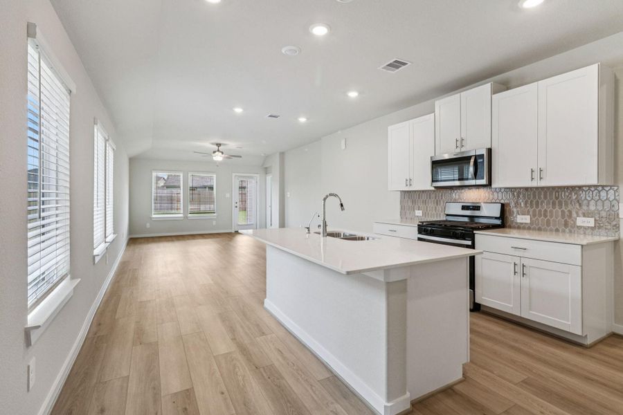 Furnished interior view inside a new home in Landing Meadows - Traditional Series, New Caney (Image 6). Furnished interior view inside a new home in Landing Meadows - Traditional Series, New Caney (Image 6).