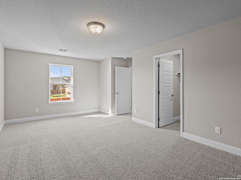 Spacious, unfurnished interior of a new home in The Reserve at Potranco Oaks, Castroville (Image 39).