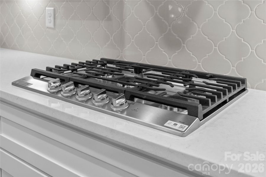 Five-burner gas cooktop.
