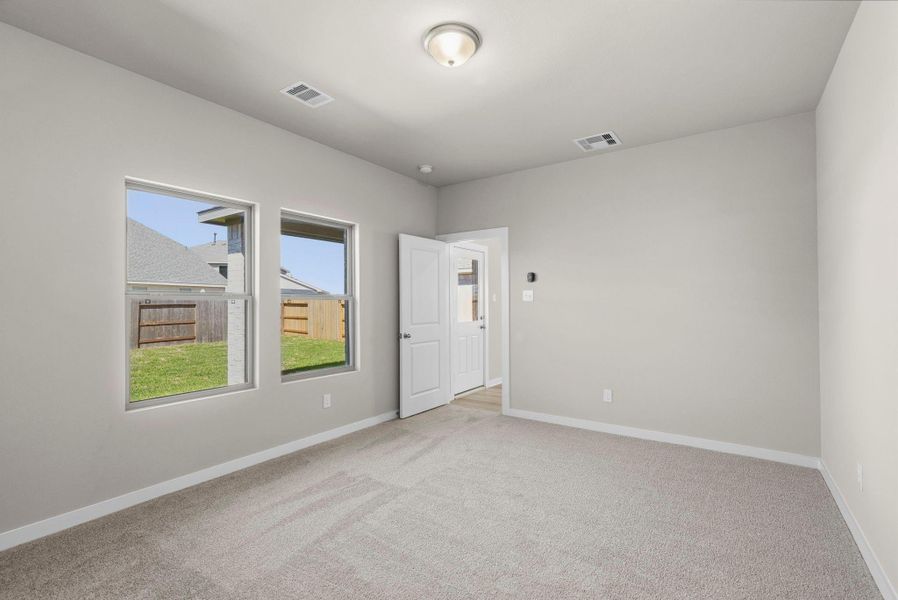 Spacious, unfurnished interior of a new home in Windrose Green, Angleton (Image 26).