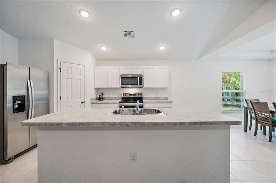 Furnished interior view inside a new home in , Port Charlotte (Image 32).
