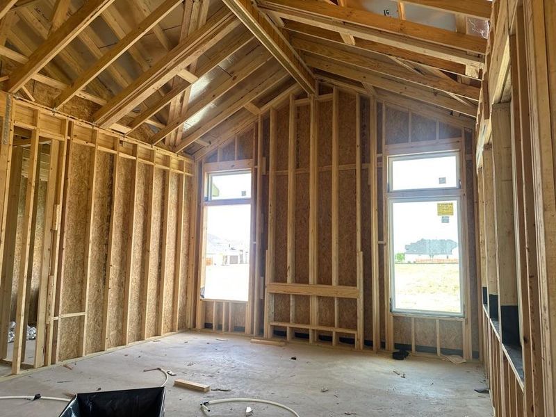 Misc room with lofted ceiling