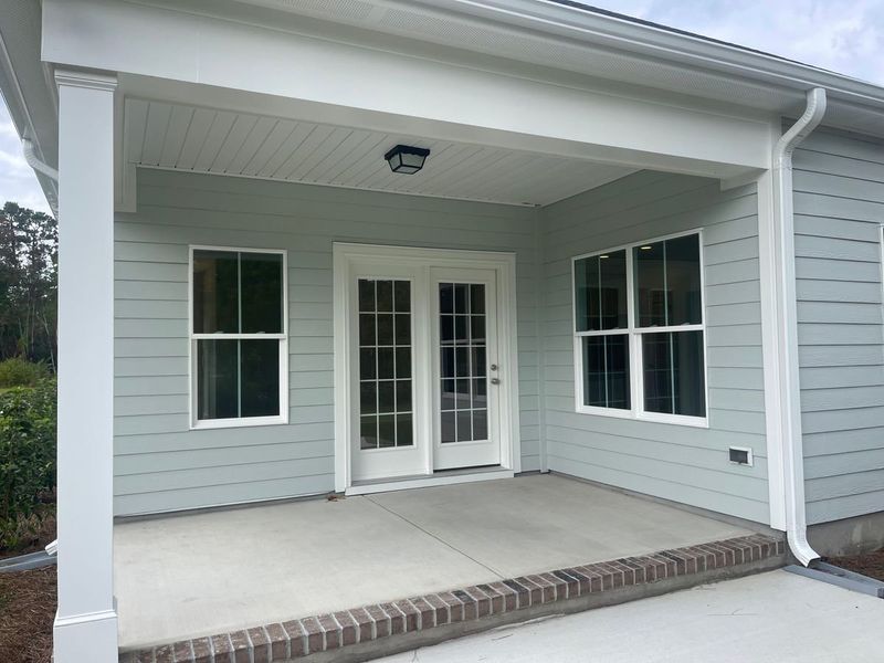 Representative exterior photo of a completed home built from the Jamestown by Bill Clark Homes in Osprey Landing, Southport, NC (Image 13).