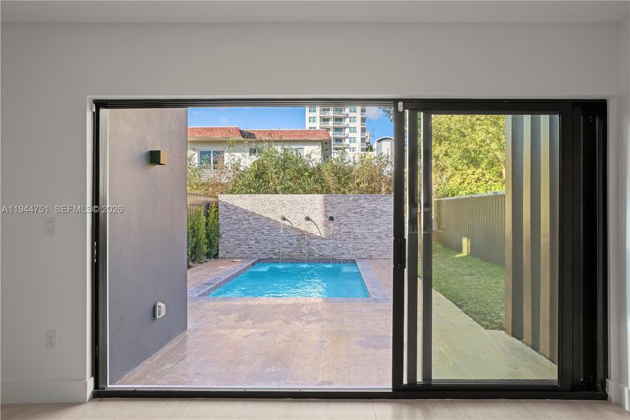 Exterior details and patio area of a home in , Miami (Image 4).