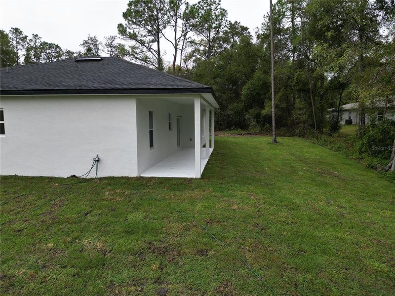 Exterior details and patio area of a home in , Citrus Springs (Image 32).