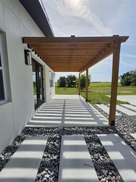 Exterior details and patio area of a home in , Morriston (Image 16).