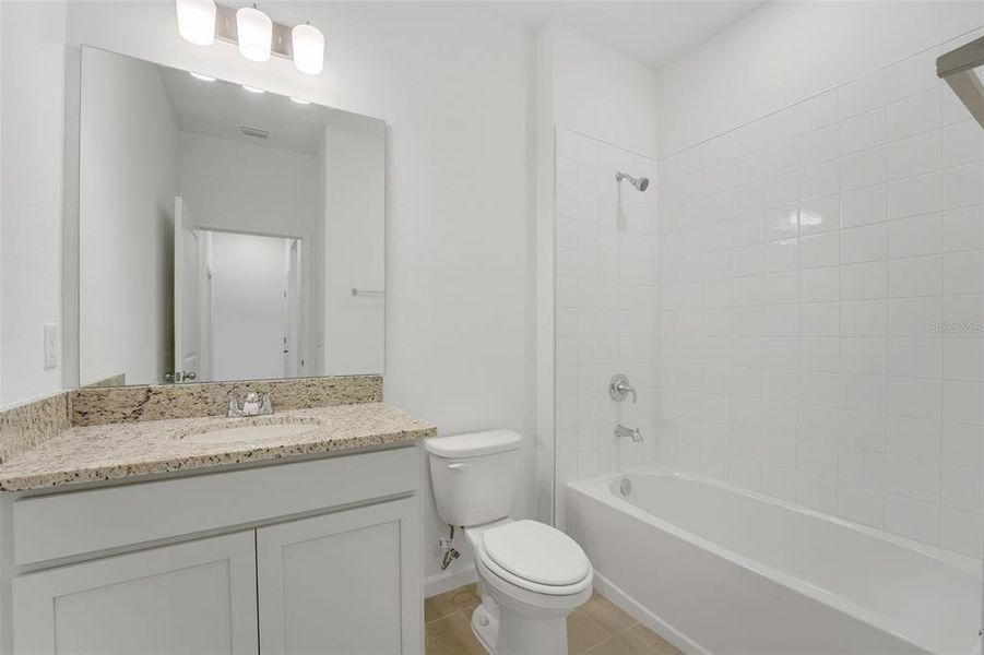 Furnished interior view inside a new home in Cypress Park Estates, Haines City (Image 14).