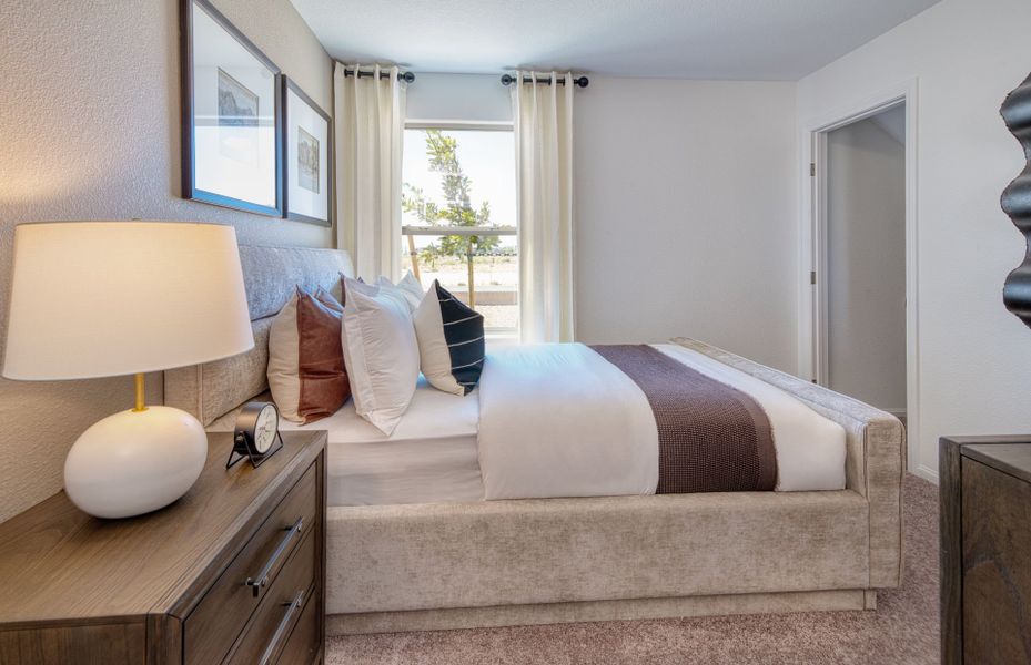 Representative furnished interior of a home built from the Kaufman by Pulte Homes in Strata, Dacono (Image 5).
