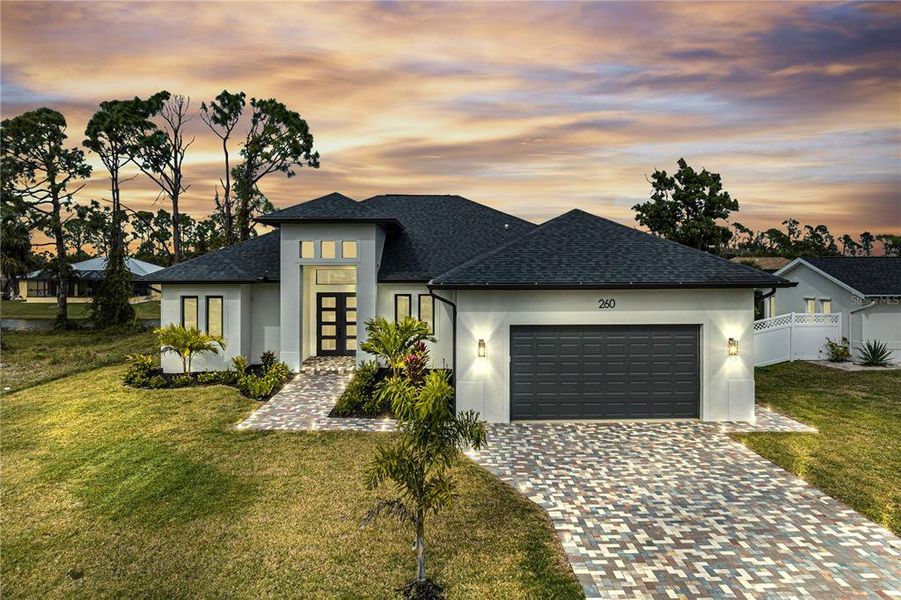 Front exterior of a new home in , Rotonda West, FL, highlighting curb appeal (Image 22).