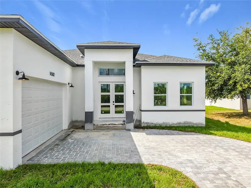 Exterior details and patio area of a home in , Port Charlotte (Image 3).