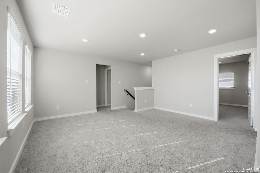 Spacious, unfurnished interior of a new home in Morgan Meadows, San Antonio (Image 35).