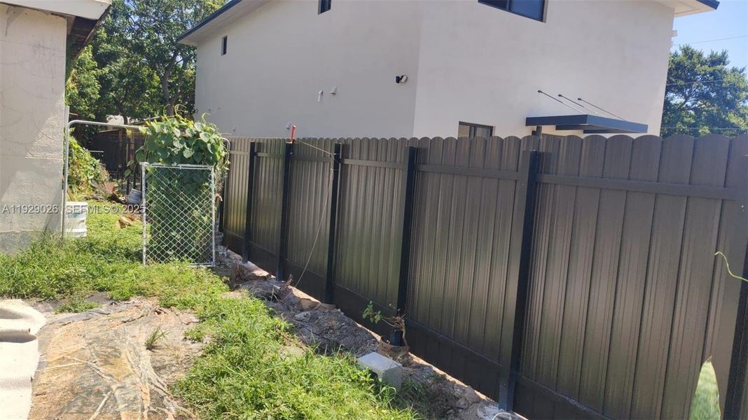 Exterior details and patio area of a home in , Miami (Image 2). Exterior details and patio area of a home in , Miami (Image 2).