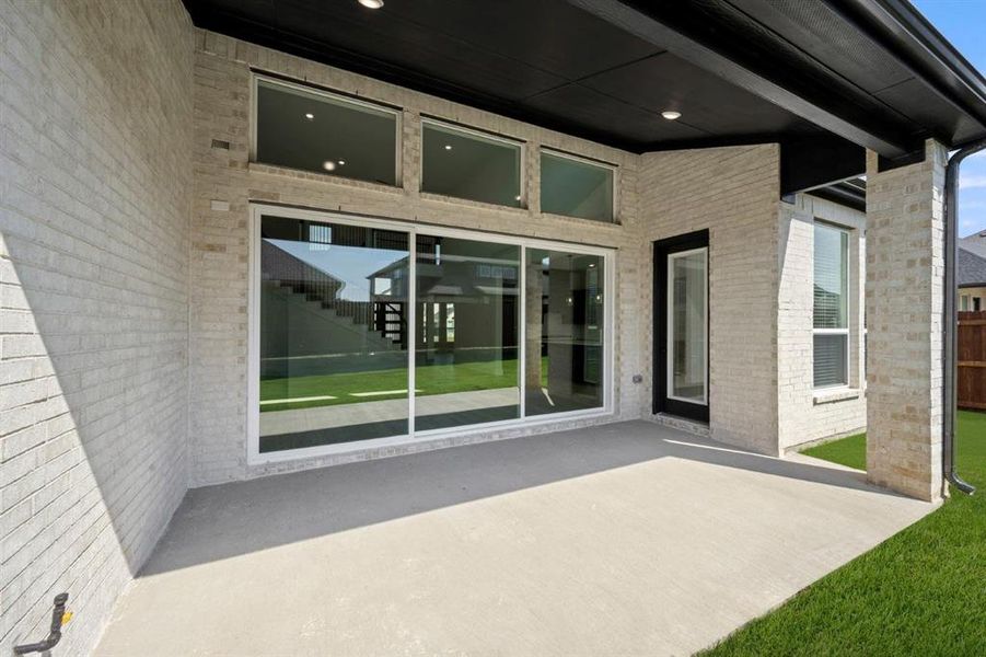 Exterior details and patio area of a home in Birdsong, Mansfield (Image 20). Exterior details and patio area of a home in Birdsong, Mansfield (Image 20).