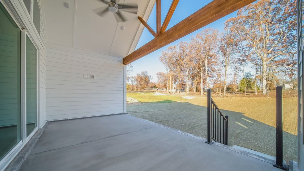 Rear of home with covered back patio
