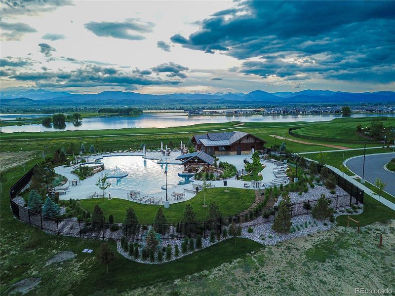 Seasonal Pool has a Hot Tub Waterfall, Swim Up Bar and Eatery Cabana